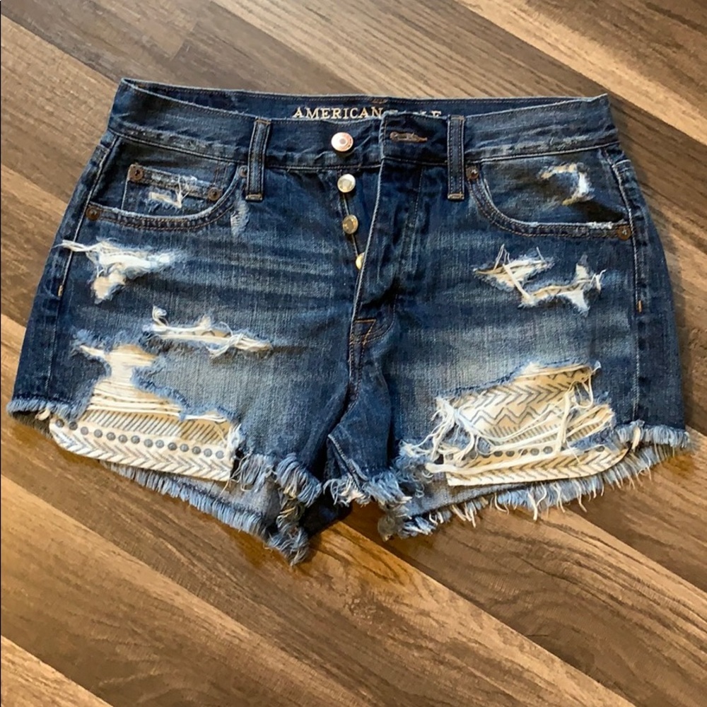 Distressed denim shorts